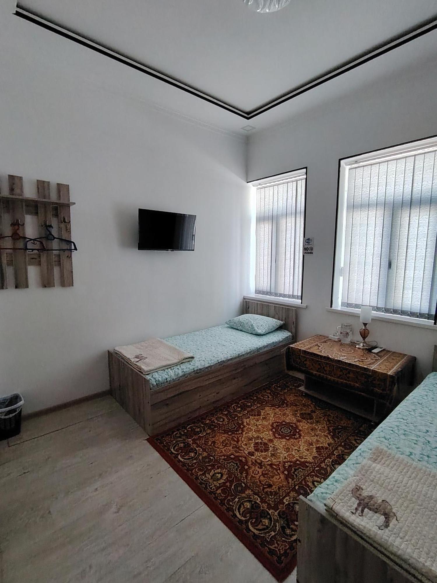 Kamir Guest House Bucara Quarto foto